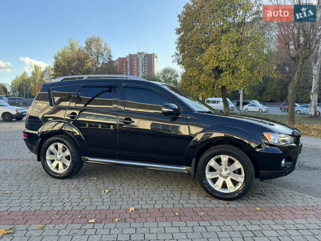 Черный Мицубиси Аутлендер, объемом двигателя 3 л и пробегом 162 тыс. км за 10800 $, фото 3 на Automoto.ua