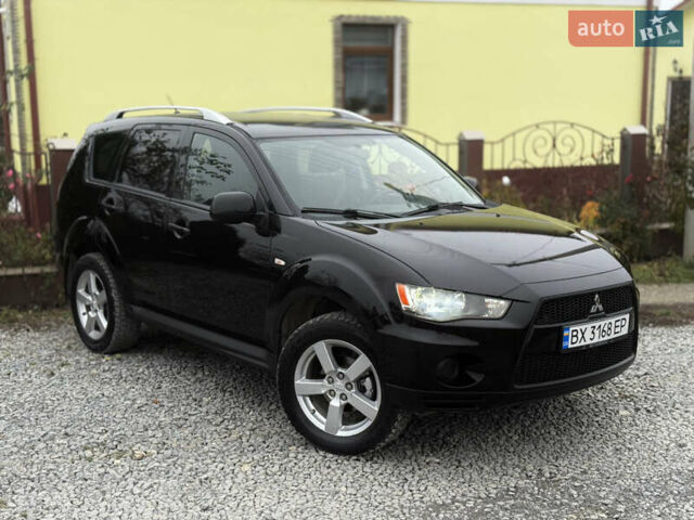 Черный Мицубиси Аутлендер, объемом двигателя 2.4 л и пробегом 184 тыс. км за 10800 $, фото 3 на Automoto.ua