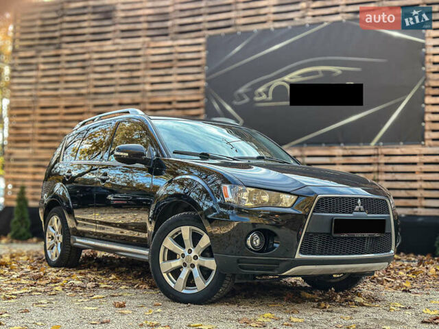 Черный Мицубиси Аутлендер, объемом двигателя 2.2 л и пробегом 226 тыс. км за 11500 $, фото 5 на Automoto.ua
