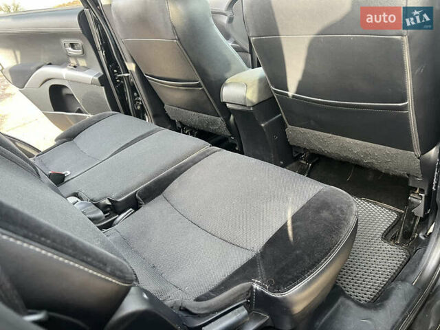 Черный Мицубиси Аутлендер, объемом двигателя 2.36 л и пробегом 244 тыс. км за 9850 $, фото 23 на Automoto.ua