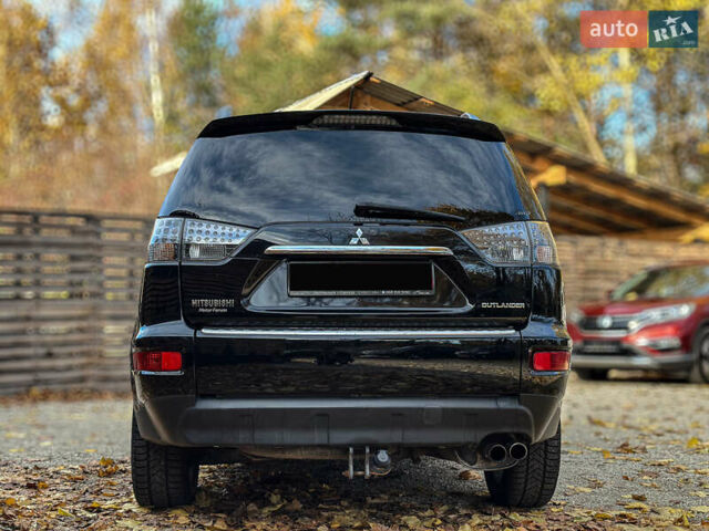 Черный Мицубиси Аутлендер, объемом двигателя 2.2 л и пробегом 226 тыс. км за 11500 $, фото 18 на Automoto.ua