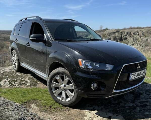 Чорний Міцубісі Аутлендер, об'ємом двигуна 2.4 л та пробігом 187 тис. км за 10200 $, фото 11 на Automoto.ua