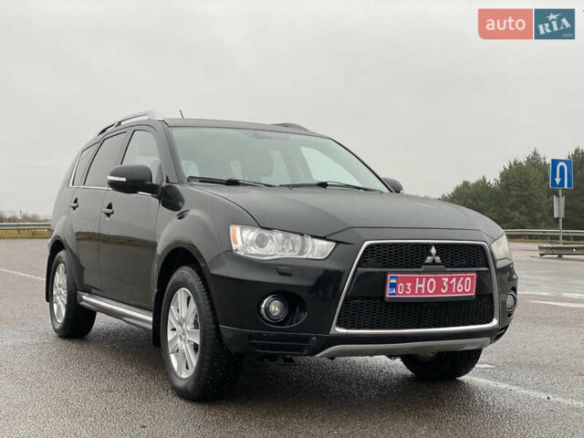 Черный Мицубиси Аутлендер, объемом двигателя 2.2 л и пробегом 227 тыс. км за 10700 $, фото 16 на Automoto.ua