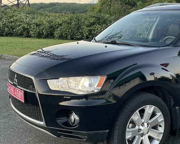 Черный Мицубиси Аутлендер, объемом двигателя 0 л и пробегом 257 тыс. км за 10399 $, фото 5 на Automoto.ua