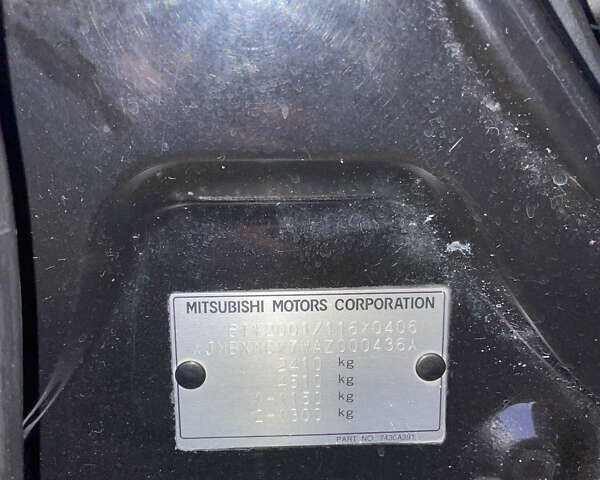 Черный Мицубиси Аутлендер, объемом двигателя 0 л и пробегом 257 тыс. км за 10399 $, фото 43 на Automoto.ua