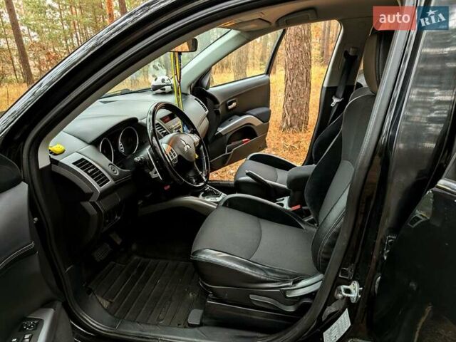 Чорний Міцубісі Аутлендер, об'ємом двигуна 2.18 л та пробігом 205 тис. км за 10200 $, фото 6 на Automoto.ua