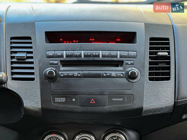 Черный Мицубиси Аутлендер, объемом двигателя 2.2 л и пробегом 226 тыс. км за 11500 $, фото 87 на Automoto.ua