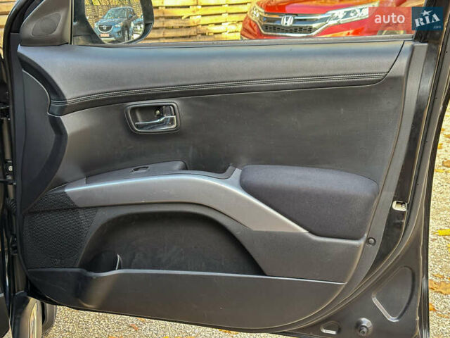 Черный Мицубиси Аутлендер, объемом двигателя 2.2 л и пробегом 226 тыс. км за 11500 $, фото 96 на Automoto.ua