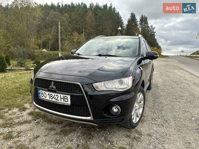 Черный Мицубиси Аутлендер, объемом двигателя 1.97 л и пробегом 224 тыс. км за 9000 $, фото 11 на Automoto.ua
