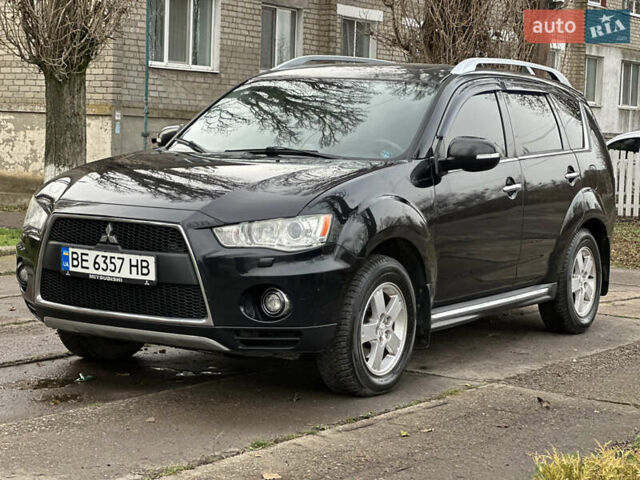 Чорний Міцубісі Аутлендер, об'ємом двигуна 2.36 л та пробігом 197 тис. км за 11300 $, фото 7 на Automoto.ua