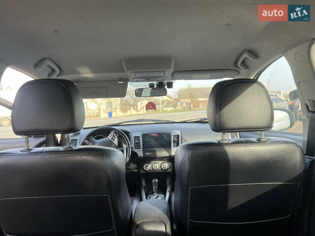 Черный Мицубиси Аутлендер, объемом двигателя 2.36 л и пробегом 244 тыс. км за 9850 $, фото 21 на Automoto.ua