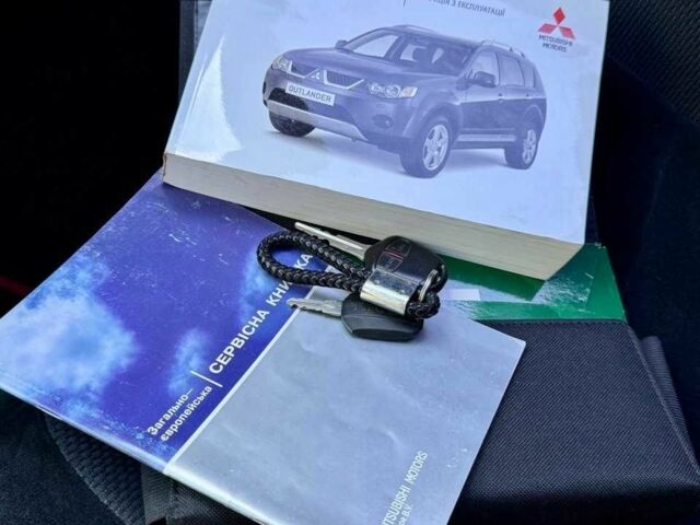 Чорний Міцубісі Аутлендер, об'ємом двигуна 2 л та пробігом 225 тис. км за 9900 $, фото 23 на Automoto.ua