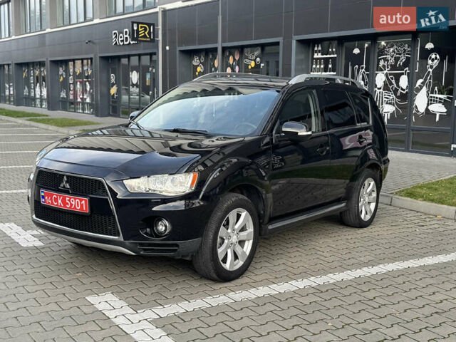 Черный Мицубиси Аутлендер, объемом двигателя 2.2 л и пробегом 225 тыс. км за 10950 $, фото 23 на Automoto.ua