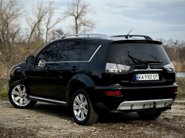 Черный Мицубиси Аутлендер, объемом двигателя 2 л и пробегом 300 тыс. км за 5500 $, фото 6 на Automoto.ua