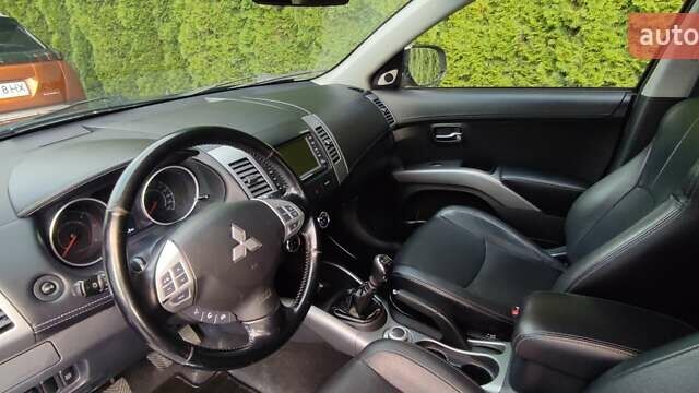 Черный Мицубиси Аутлендер, объемом двигателя 2 л и пробегом 210 тыс. км за 10600 $, фото 9 на Automoto.ua