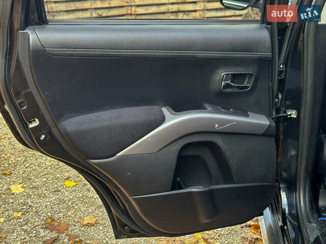 Черный Мицубиси Аутлендер, объемом двигателя 2.2 л и пробегом 226 тыс. км за 11500 $, фото 80 на Automoto.ua