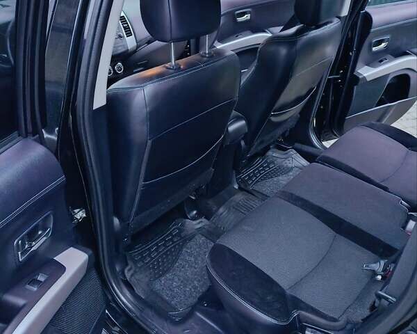 Черный Мицубиси Аутлендер, объемом двигателя 2.2 л и пробегом 225 тыс. км за 11500 $, фото 7 на Automoto.ua