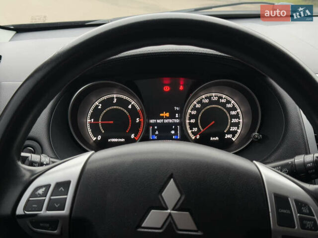 Чорний Міцубісі Аутлендер, об'ємом двигуна 1.97 л та пробігом 276 тис. км за 9200 $, фото 12 на Automoto.ua