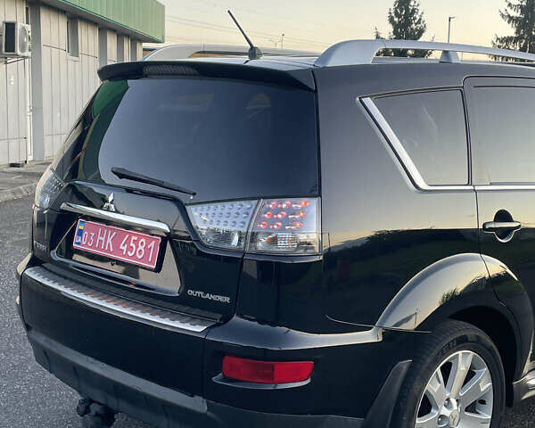 Черный Мицубиси Аутлендер, объемом двигателя 0 л и пробегом 257 тыс. км за 10399 $, фото 13 на Automoto.ua