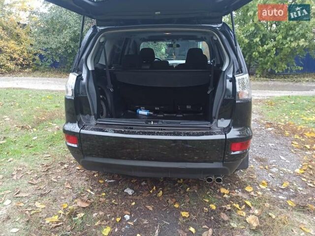 Черный Мицубиси Аутлендер, объемом двигателя 3 л и пробегом 240 тыс. км за 9500 $, фото 12 на Automoto.ua