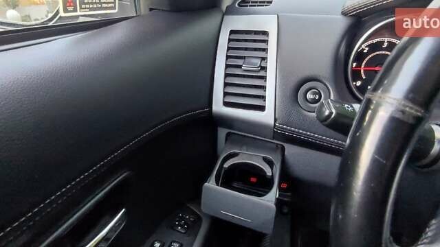 Черный Мицубиси Аутлендер, объемом двигателя 2 л и пробегом 210 тыс. км за 10600 $, фото 26 на Automoto.ua