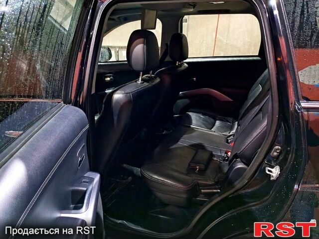 Черный Мицубиси Аутлендер, объемом двигателя 2.4 л и пробегом 70 тыс. км за 10500 $, фото 8 на Automoto.ua