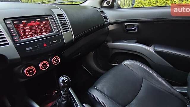 Черный Мицубиси Аутлендер, объемом двигателя 2 л и пробегом 210 тыс. км за 10600 $, фото 21 на Automoto.ua