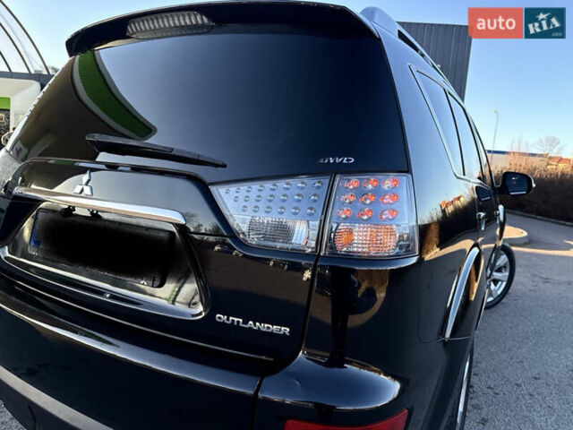 Черный Мицубиси Аутлендер, объемом двигателя 2.2 л и пробегом 263 тыс. км за 11300 $, фото 8 на Automoto.ua