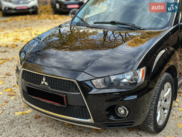 Черный Мицубиси Аутлендер, объемом двигателя 2.2 л и пробегом 226 тыс. км за 11500 $, фото 32 на Automoto.ua