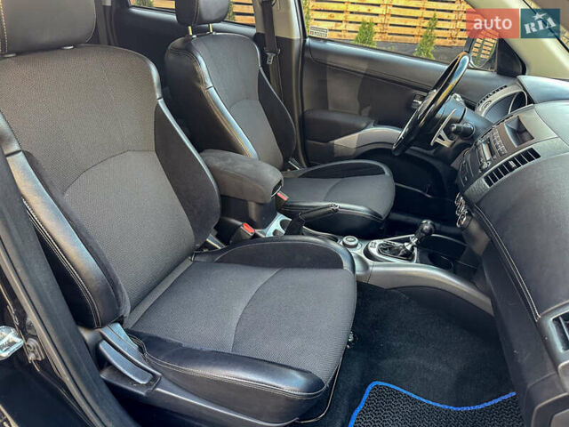 Черный Мицубиси Аутлендер, объемом двигателя 2.2 л и пробегом 226 тыс. км за 11500 $, фото 97 на Automoto.ua