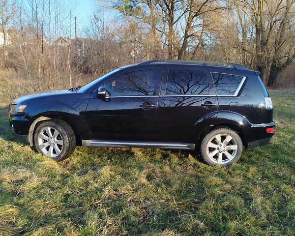 Черный Мицубиси Аутлендер, объемом двигателя 2 л и пробегом 261 тыс. км за 9700 $, фото 11 на Automoto.ua