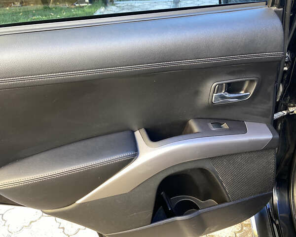 Черный Мицубиси Аутлендер, объемом двигателя 1.97 л и пробегом 292 тыс. км за 10900 $, фото 29 на Automoto.ua