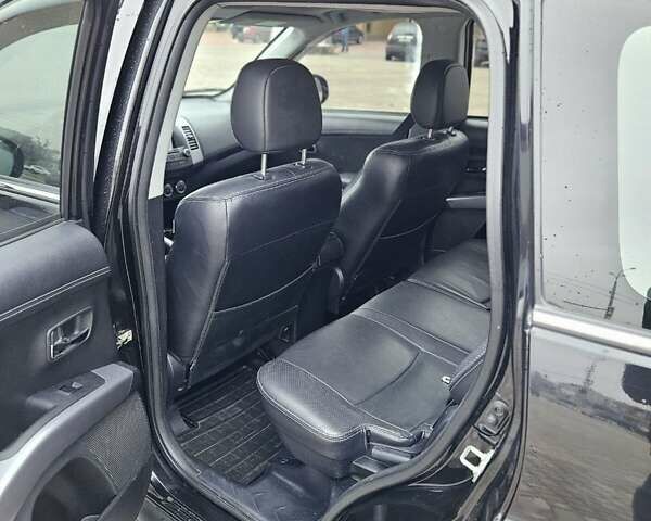 Чорний Міцубісі Аутлендер, об'ємом двигуна 2.4 л та пробігом 70 тис. км за 13000 $, фото 15 на Automoto.ua