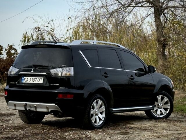 Черный Мицубиси Аутлендер, объемом двигателя 2 л и пробегом 300 тыс. км за 5500 $, фото 7 на Automoto.ua