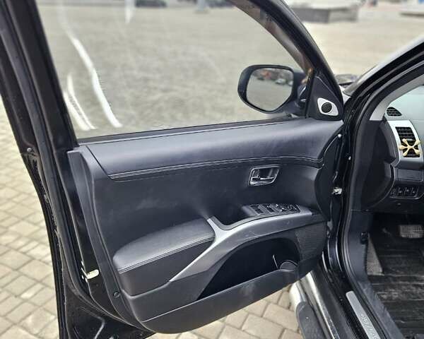 Чорний Міцубісі Аутлендер, об'ємом двигуна 2.4 л та пробігом 70 тис. км за 13000 $, фото 9 на Automoto.ua