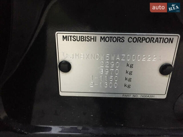 Черный Мицубиси Аутлендер, объемом двигателя 2.36 л и пробегом 315 тыс. км за 9700 $, фото 16 на Automoto.ua