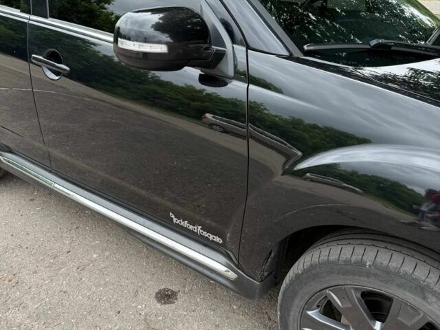 Чорний Міцубісі Аутлендер, об'ємом двигуна 2 л та пробігом 210 тис. км за 10700 $, фото 2 на Automoto.ua