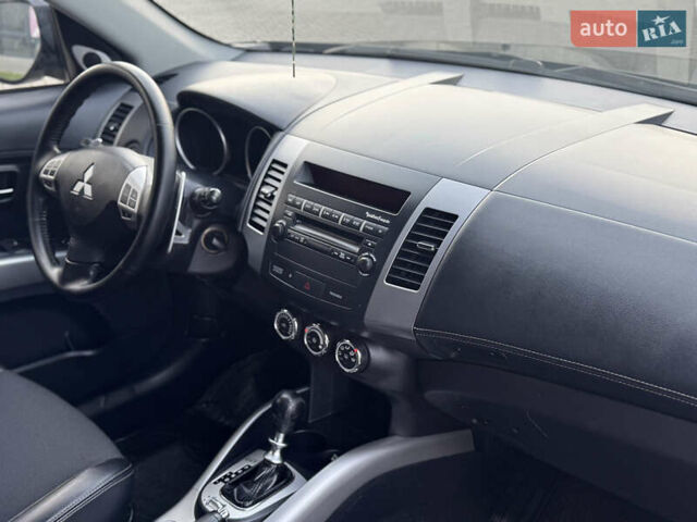 Черный Мицубиси Аутлендер, объемом двигателя 2.2 л и пробегом 225 тыс. км за 10950 $, фото 31 на Automoto.ua