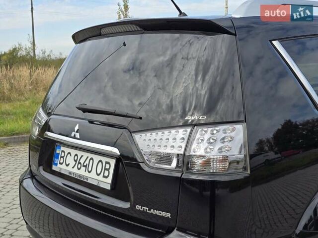 Черный Мицубиси Аутлендер, объемом двигателя 1.97 л и пробегом 270 тыс. км за 11700 $, фото 10 на Automoto.ua