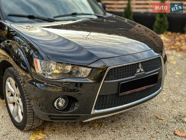 Черный Мицубиси Аутлендер, объемом двигателя 2.2 л и пробегом 226 тыс. км за 11500 $, фото 25 на Automoto.ua