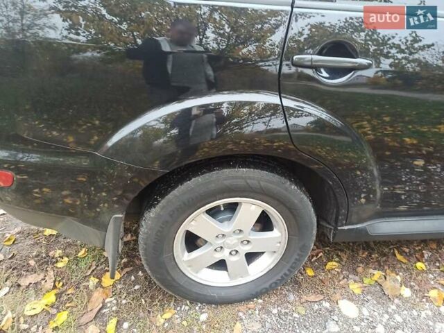 Черный Мицубиси Аутлендер, объемом двигателя 3 л и пробегом 240 тыс. км за 9500 $, фото 9 на Automoto.ua