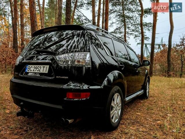 Чорний Міцубісі Аутлендер, об'ємом двигуна 2.18 л та пробігом 205 тис. км за 10200 $, фото 4 на Automoto.ua