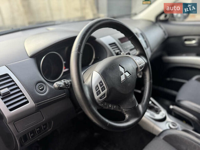 Черный Мицубиси Аутлендер, объемом двигателя 2.2 л и пробегом 225 тыс. км за 10950 $, фото 34 на Automoto.ua