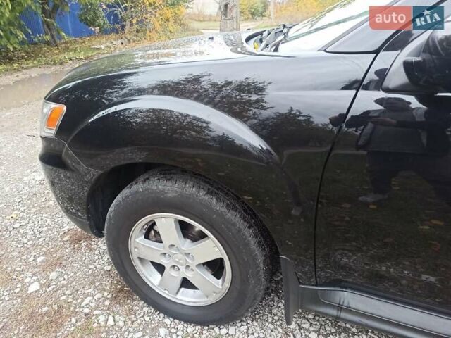 Черный Мицубиси Аутлендер, объемом двигателя 3 л и пробегом 240 тыс. км за 9500 $, фото 6 на Automoto.ua
