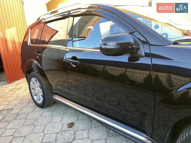 Черный Мицубиси Аутлендер, объемом двигателя 1.97 л и пробегом 292 тыс. км за 10900 $, фото 6 на Automoto.ua
