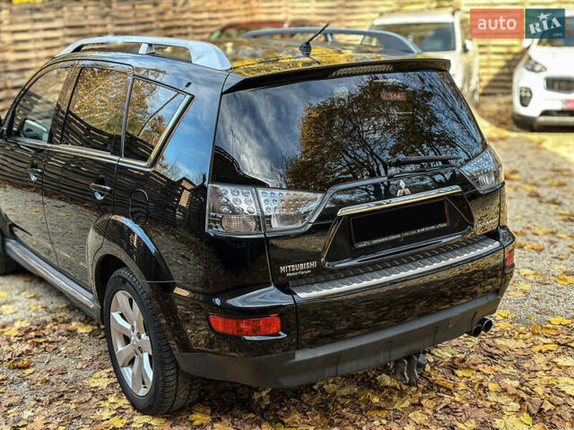 Черный Мицубиси Аутлендер, объемом двигателя 2.2 л и пробегом 226 тыс. км за 11500 $, фото 35 на Automoto.ua