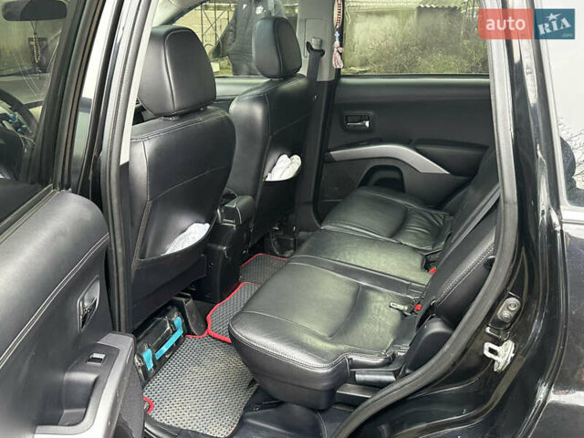 Чорний Міцубісі Аутлендер, об'ємом двигуна 2.36 л та пробігом 197 тис. км за 11300 $, фото 14 на Automoto.ua