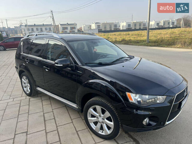 Чорний Міцубісі Аутлендер, об'ємом двигуна 2.36 л та пробігом 244 тис. км за 9850 $, фото 11 на Automoto.ua