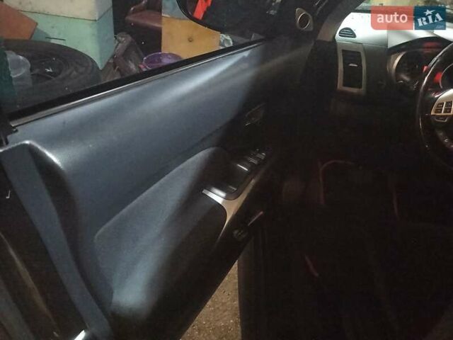 Черный Мицубиси Аутлендер, объемом двигателя 3 л и пробегом 240 тыс. км за 9500 $, фото 10 на Automoto.ua