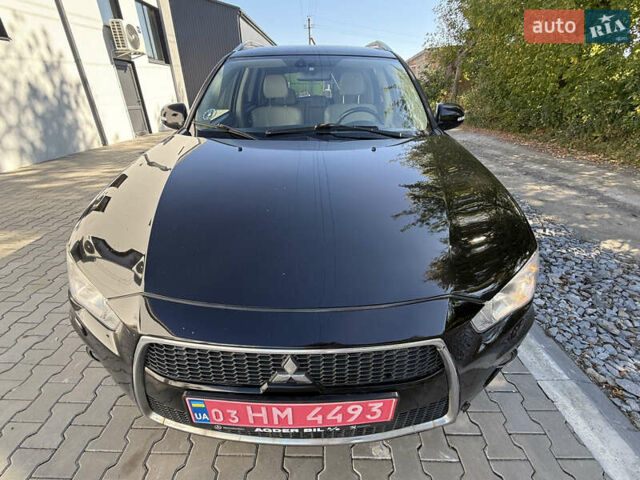 Черный Мицубиси Аутлендер, объемом двигателя 2.2 л и пробегом 270 тыс. км за 10700 $, фото 5 на Automoto.ua